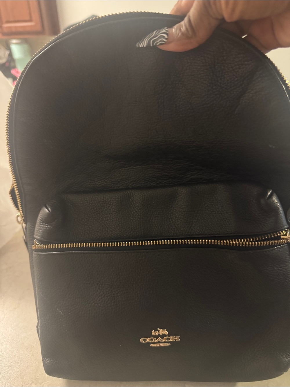 Coach Black Leather Backpack with Gold Hardware
